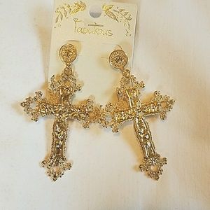 Gold  cross earrings.